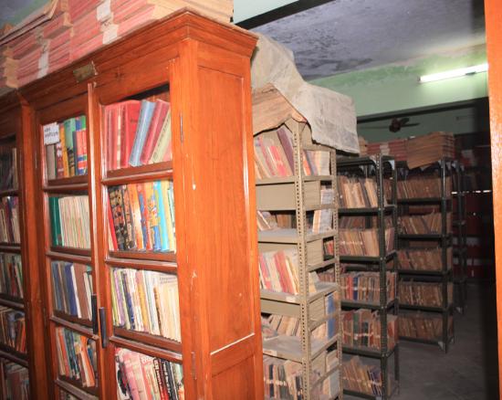 Shelves of books in an old community library