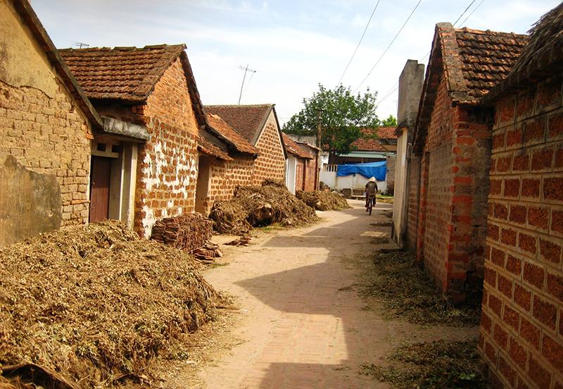 An old village lane lined with brick homes